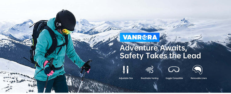 Skier wearing Vanrora helmet and goggles in a snowy mountain environment