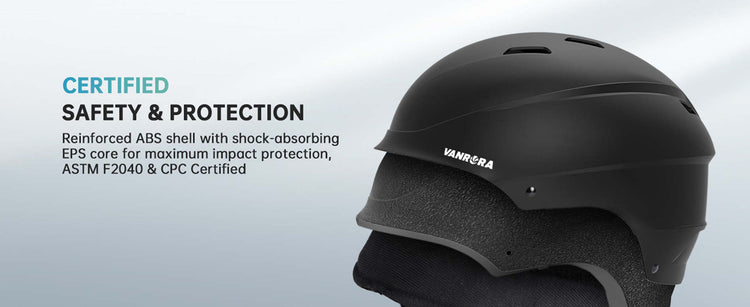 Black helmet with certification text on a light gray background